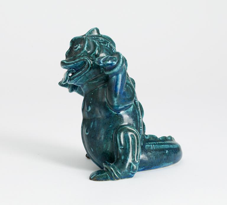 A Wilhelm Kåge stoneware figure of a dragon puppy, Gustavsberg studio circa 1940.