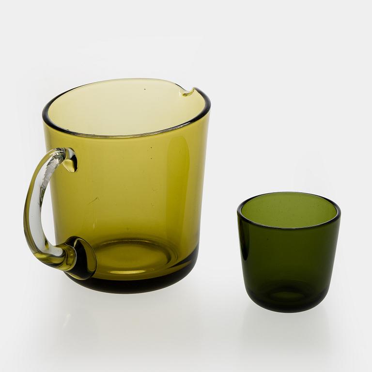 Kaj Franck, a mid-20th century "5601" glass pitcher and a twelve "5023" glasses, Nuutajärvi, Finland.