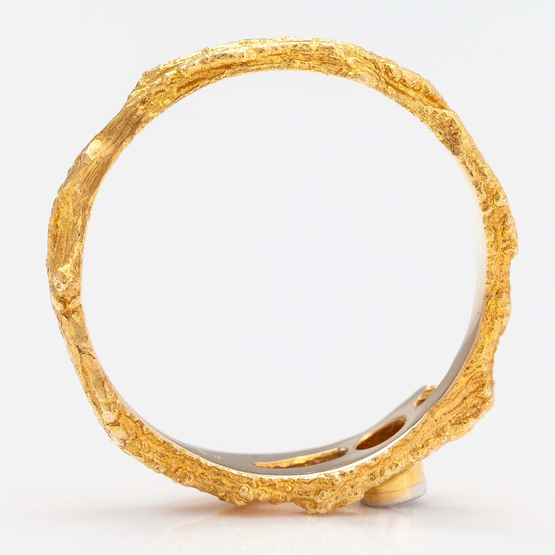 Björn Weckström, Ring "Diamantdamm", 18K guld och diamant ca 0.02 ct. Lapponia 1975.