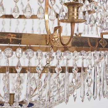 A late Gustavian gilt brass and cut glass thirteen-light chandelier, circa 1800.