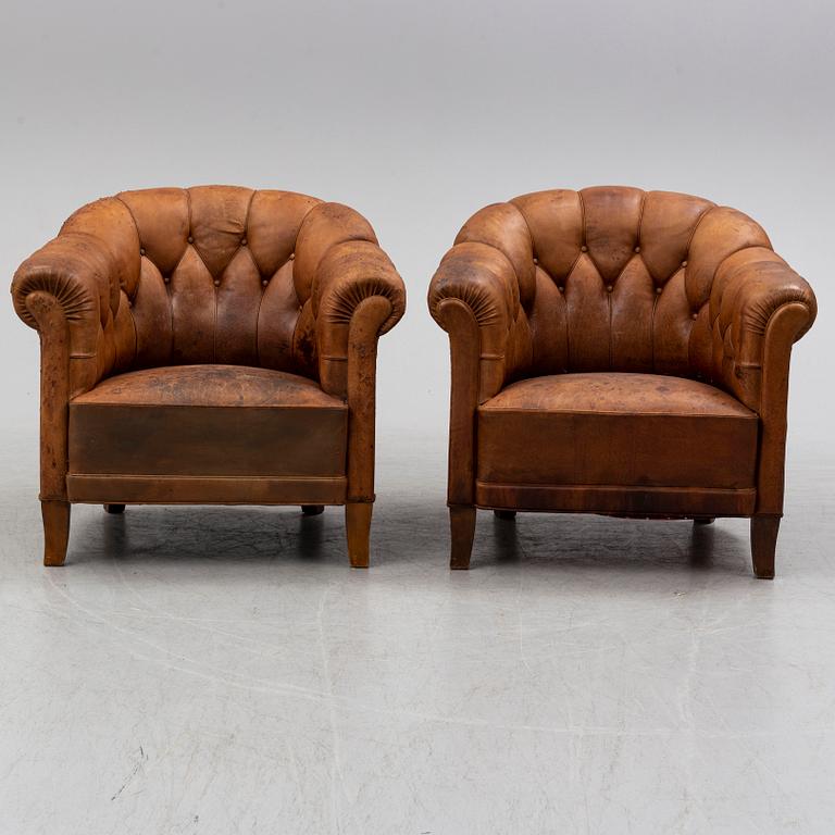 A pair of armchairs from the first half of the 20th century.