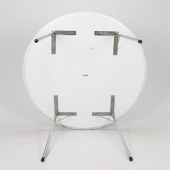 Arne Jacobsen, a 1970s '3600' diningtable for Fritz Hansen.