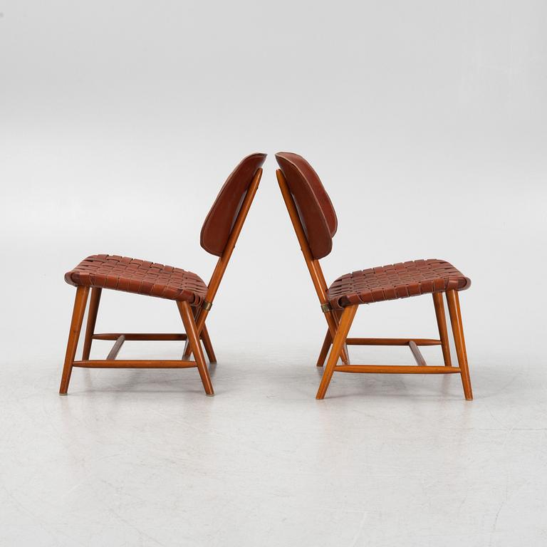Alf Svensson, a pair of 'TeVe' easy chairs with new leather upholstery, 1950s.