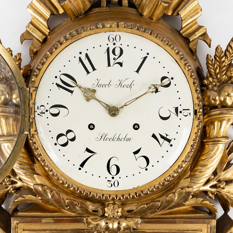 A gilt Gustavian wall clock, Jacob Kock (Royal Clockmaker in Stockholm 1762-1803).