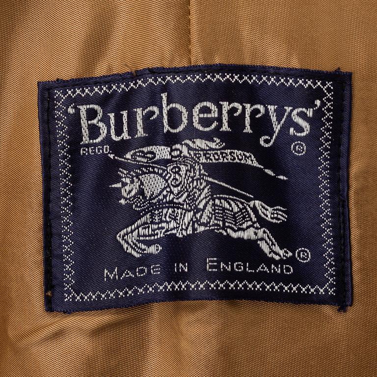 A Burberry trench coat with lining size 10.