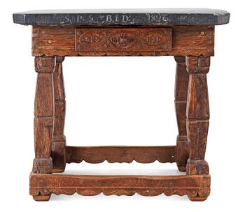 A Swedish stone top table dated 1826.