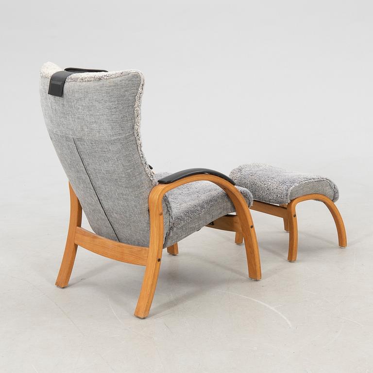 Jahn Aamodt armchair with footstool "Easy" for Conform, 21st century.