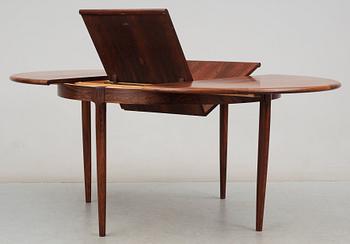 A Niels Ole Møller palisander dining table and nine chairs, J.L. Møller, Denmark 1950's-60's.