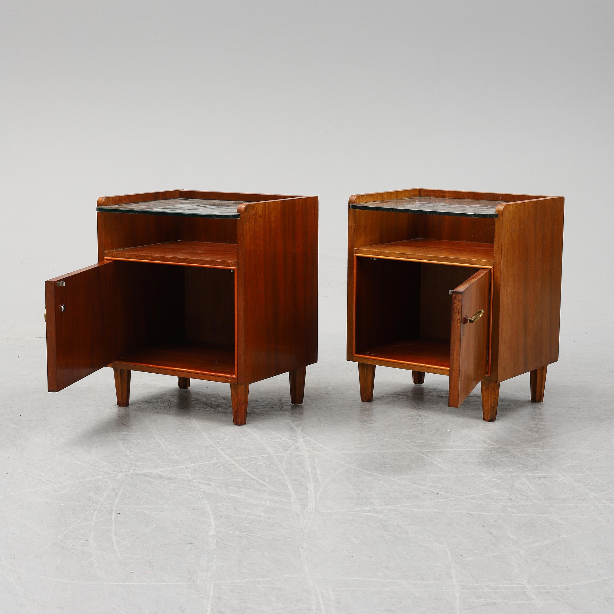 A pair of mahogany bedside tables, mid 20th Century.