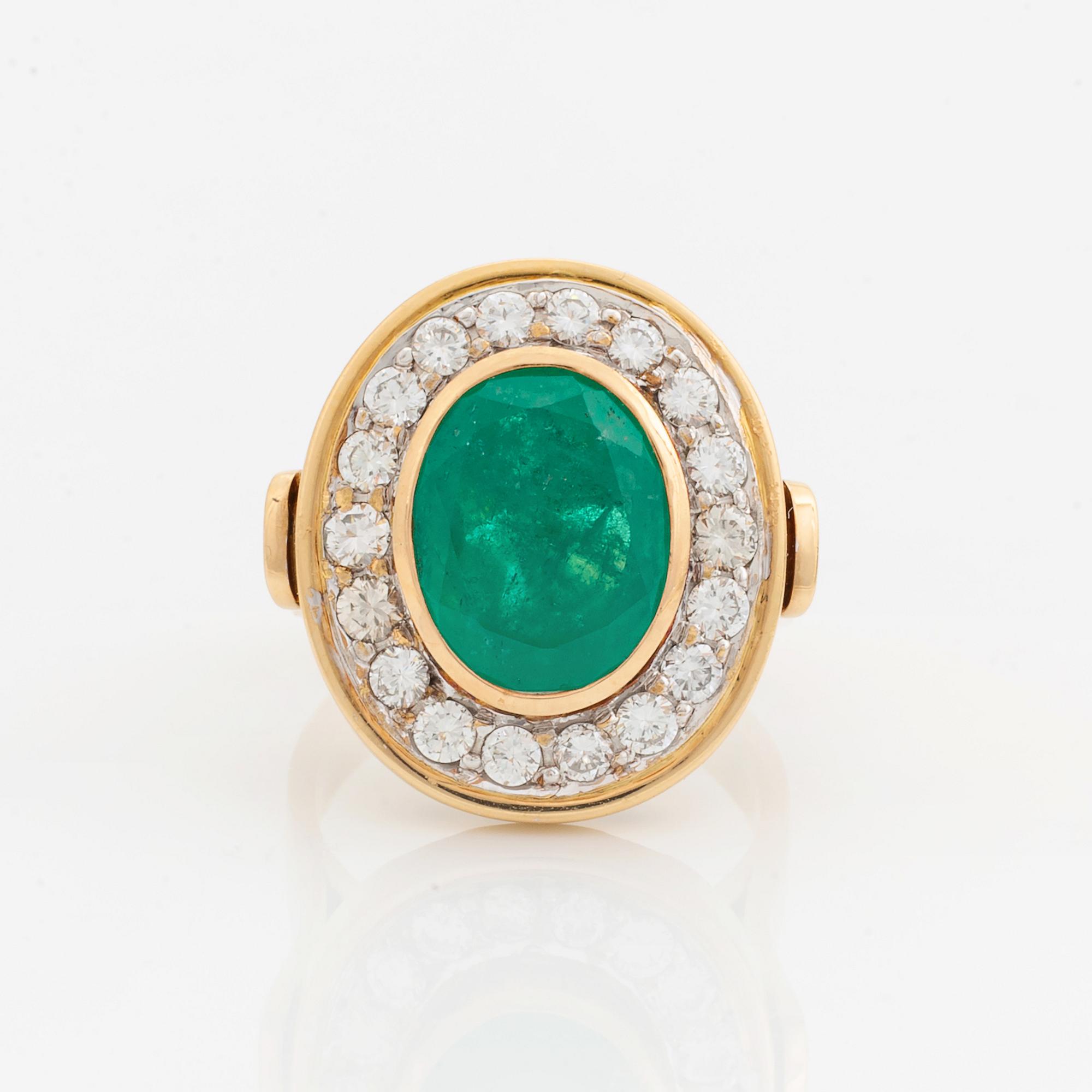 Emerald and brilliant-cut diamond ring.