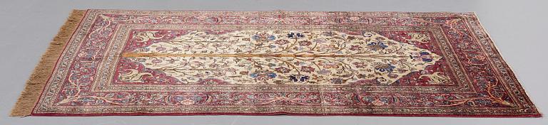 MATTO, a semi-antique silk Kashan,  ca 205 x 131,5 cm.