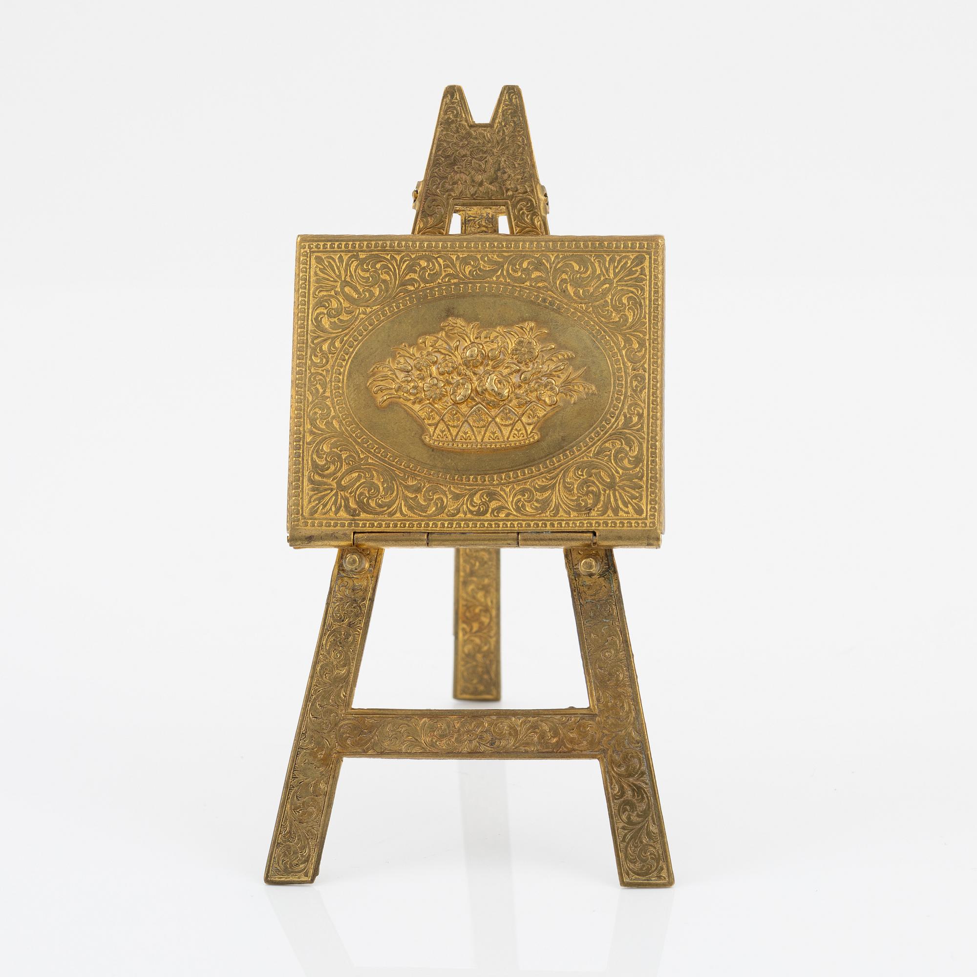 A gilt metal stamp holder, W. Avery & Son, Redditch, England, late 19th Century.