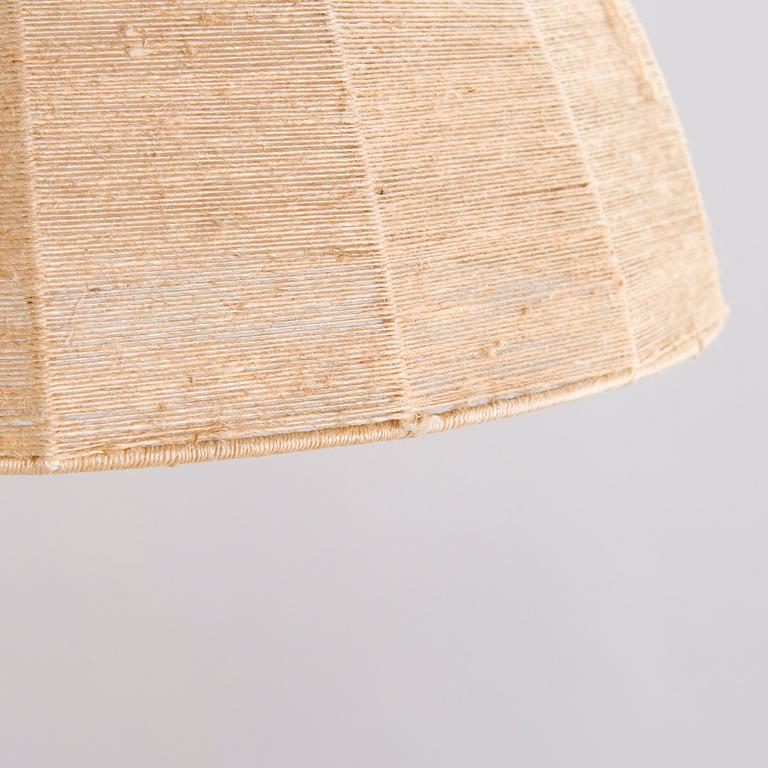 A mid-20th century wall light for Valinte, Finland.