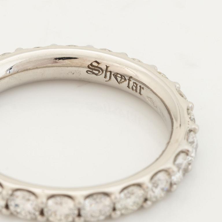 Brilliant cut diamond eternity ring.