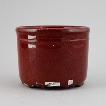 A sang de boef glazed censer/flower pot, China, early 20th Century.