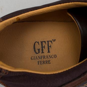 a pair of sneakers by Gianfranco Ferre.