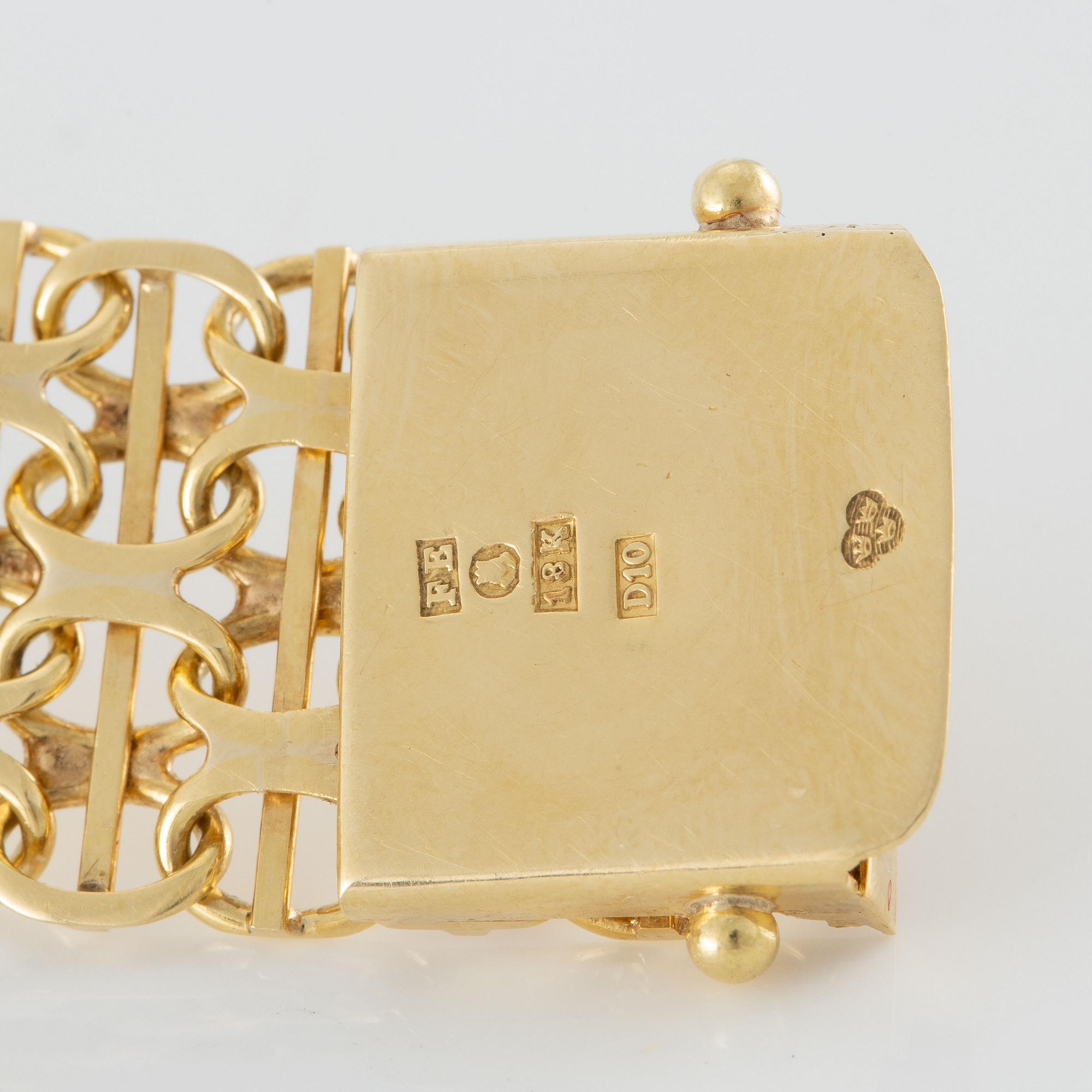 Omega, Genève, wristwatch, 14K gold, bracelet in 18K gold, 34.5 mm.