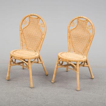 A pair of second half of the 20th cnetury rattan chairs.