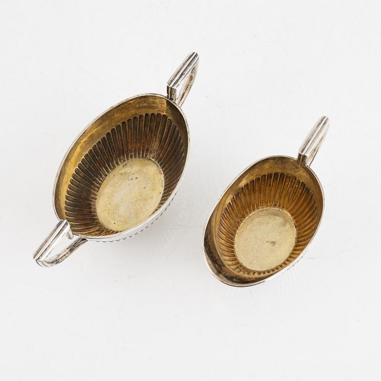 A Swedish sugerbowl and creamer, 2 pieces, silver, mark of K Anderson, Stockholm 1908. Gustavian style.