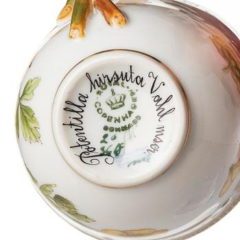 A set of nine Royal Copenhagen 'Flora Danica' cups with saucers, Denmark, 20th century.