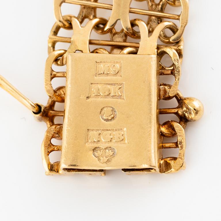 Collier, 18K guld, x-länk med hänge med snäckskalscamé.