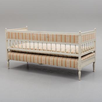 An early 19th century painted late Gustavian sofa.