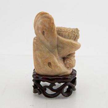 A Chinese stone sculpture 20th century.