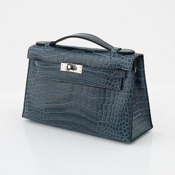 Hermès, A 'Kelly Pochette' in Shiny Alligator Mississippiensis Palladium Hardware, 2016.