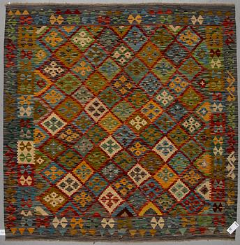 A kilim rug, ca 199 x 201 cm.
