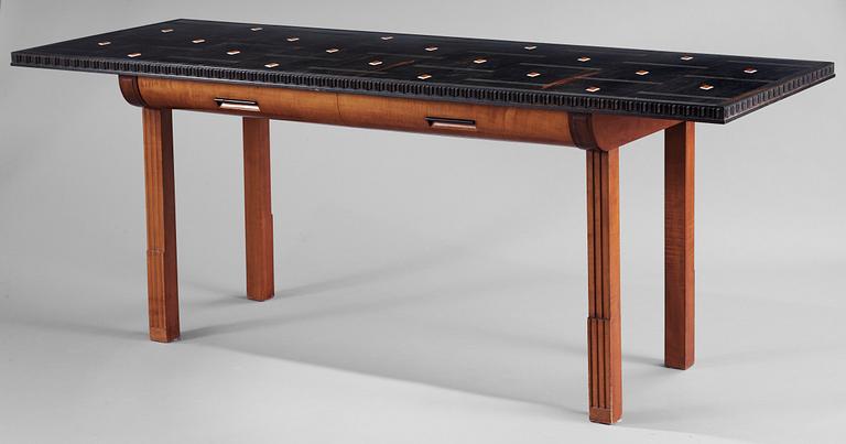 A Hjalmar Jackson ebony and pear wood desk / library table, Stockholm 1934, possibly designed by Oscar Nilsson.