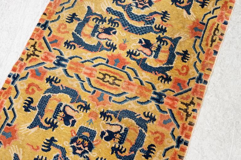 A Chinese antique Ningxia rug, late Qing dynasty, c. 128 x 67 cm.