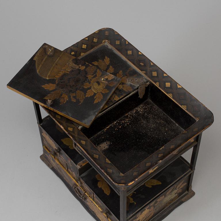 A Japanese miniture cabinet, Meiji period (1868-1912).