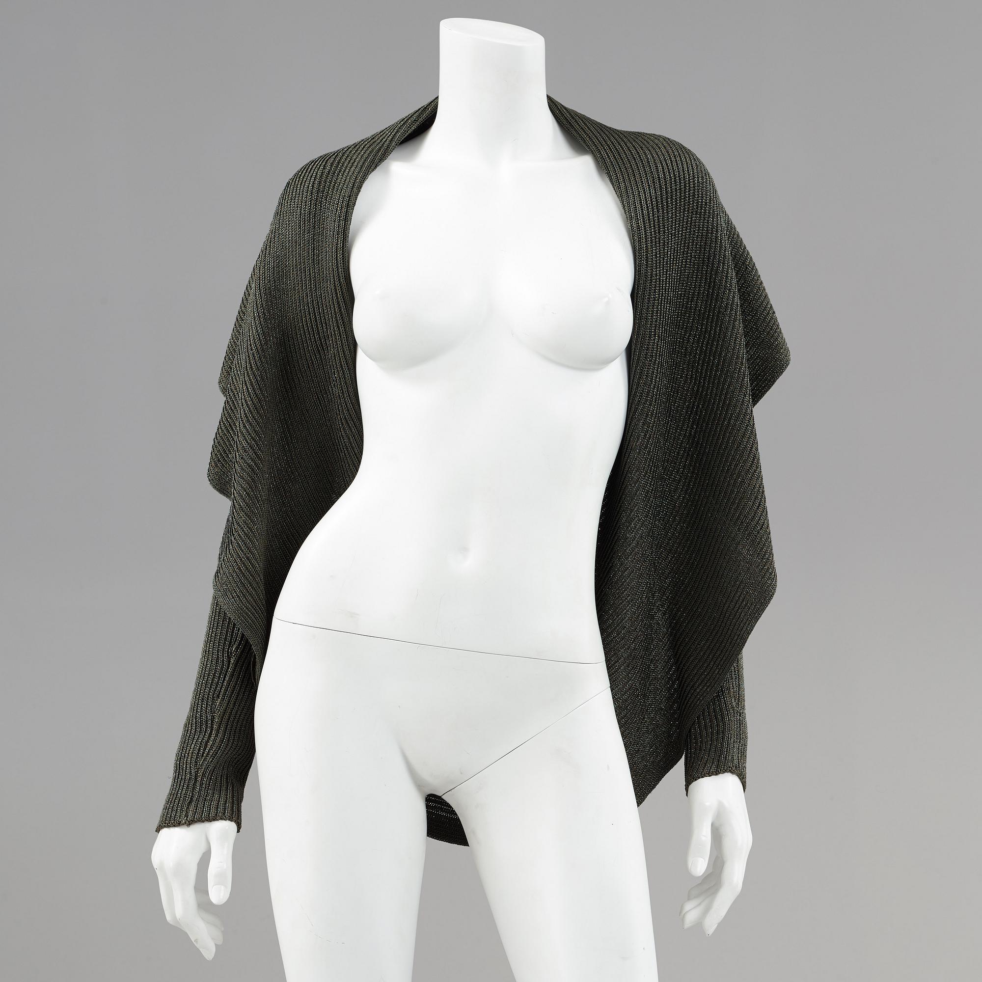 Two cardigans and a silkblouse by Ralph Lauren.