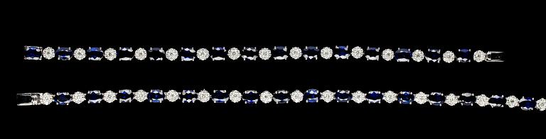 A blue sapphire and diamond necklace and bracelet, tot. app. 5 cts of diamonds.