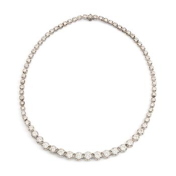 An 18K white gold necklace set with round brilliant- and eight-cut diamonds.