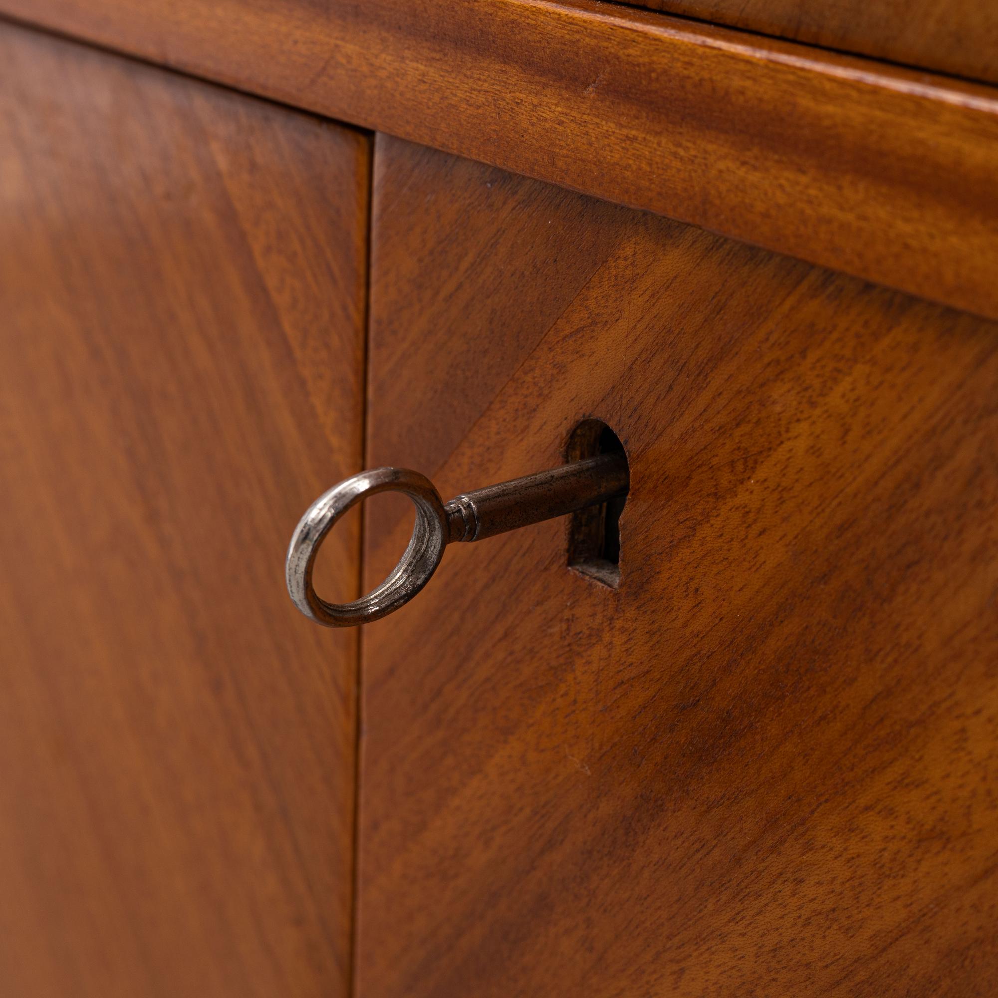 A ahogany-veneered 1940's/50's bookcase.