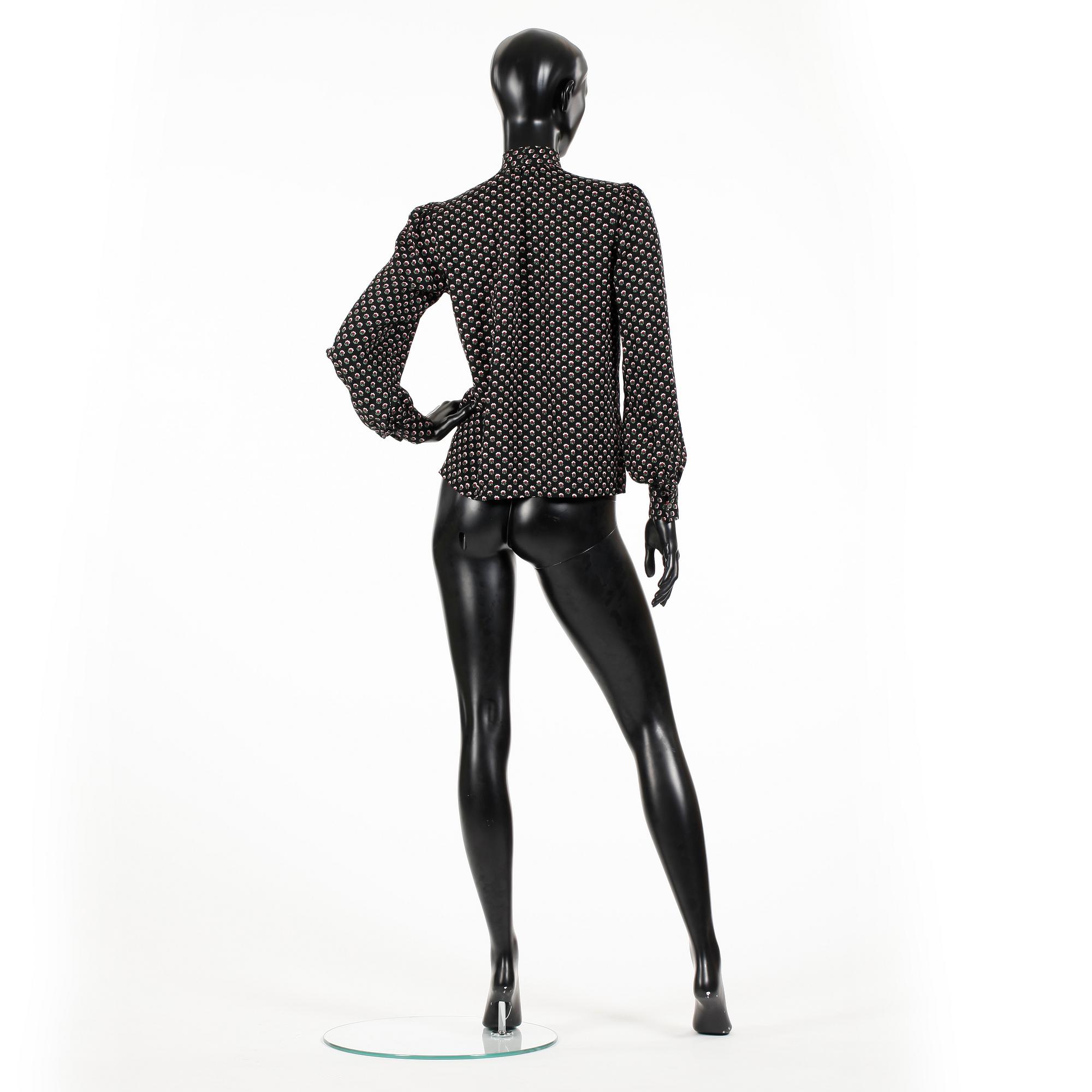 YVES SAINT LAURENT, two silk blouses.