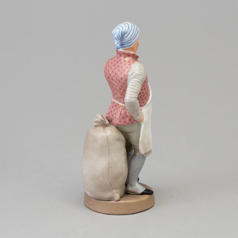 A Bing & Gröndahl figure of a miller, Denmark, 1894.