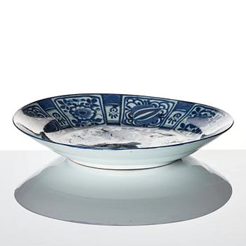 A blue and white Japanese kraak style dish, 18th Century.