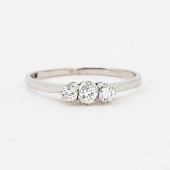 Brilliant-cut diamond three stone ring.