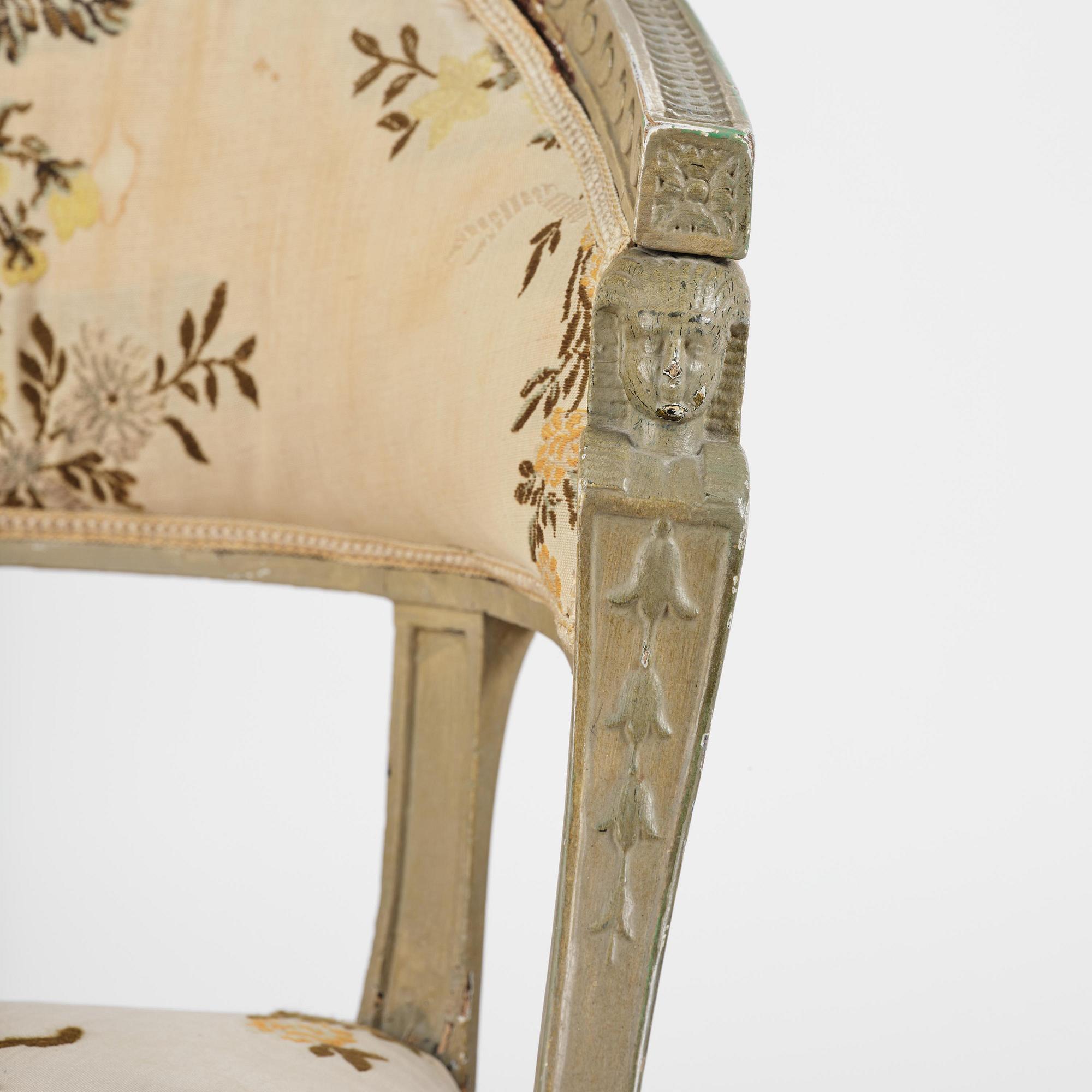 A pair of late Gustavian open-back armchairs attributed to E. Ståhl (master in Stockholm 1794-1820).