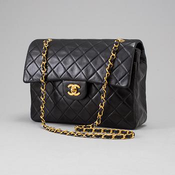 A "Double Flap bag" by Chanel.