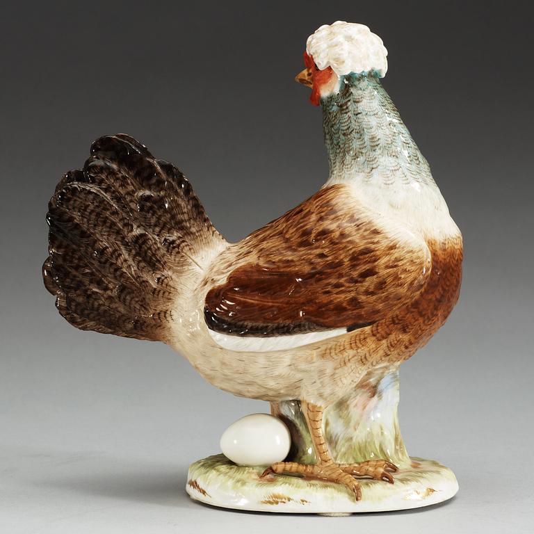A Meissen figure of a hen with an egg, 19th Century.
