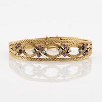 Bracelet in 18K gold with pink sapphires and brilliant-cut diamonds.