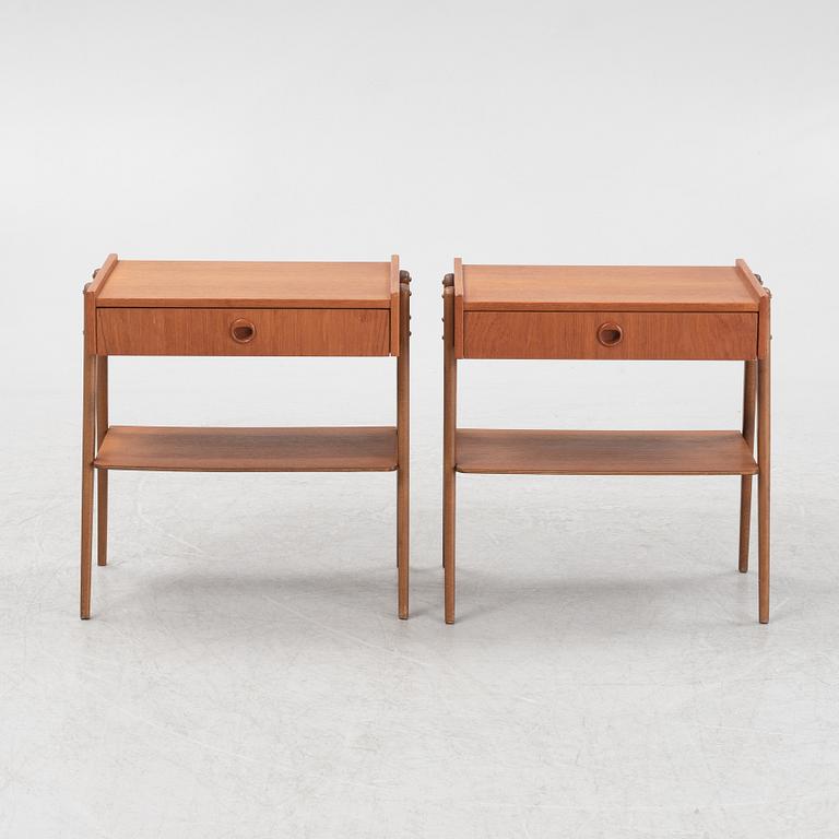 A pair of teak veneered bedside tables, 1950's/60's.