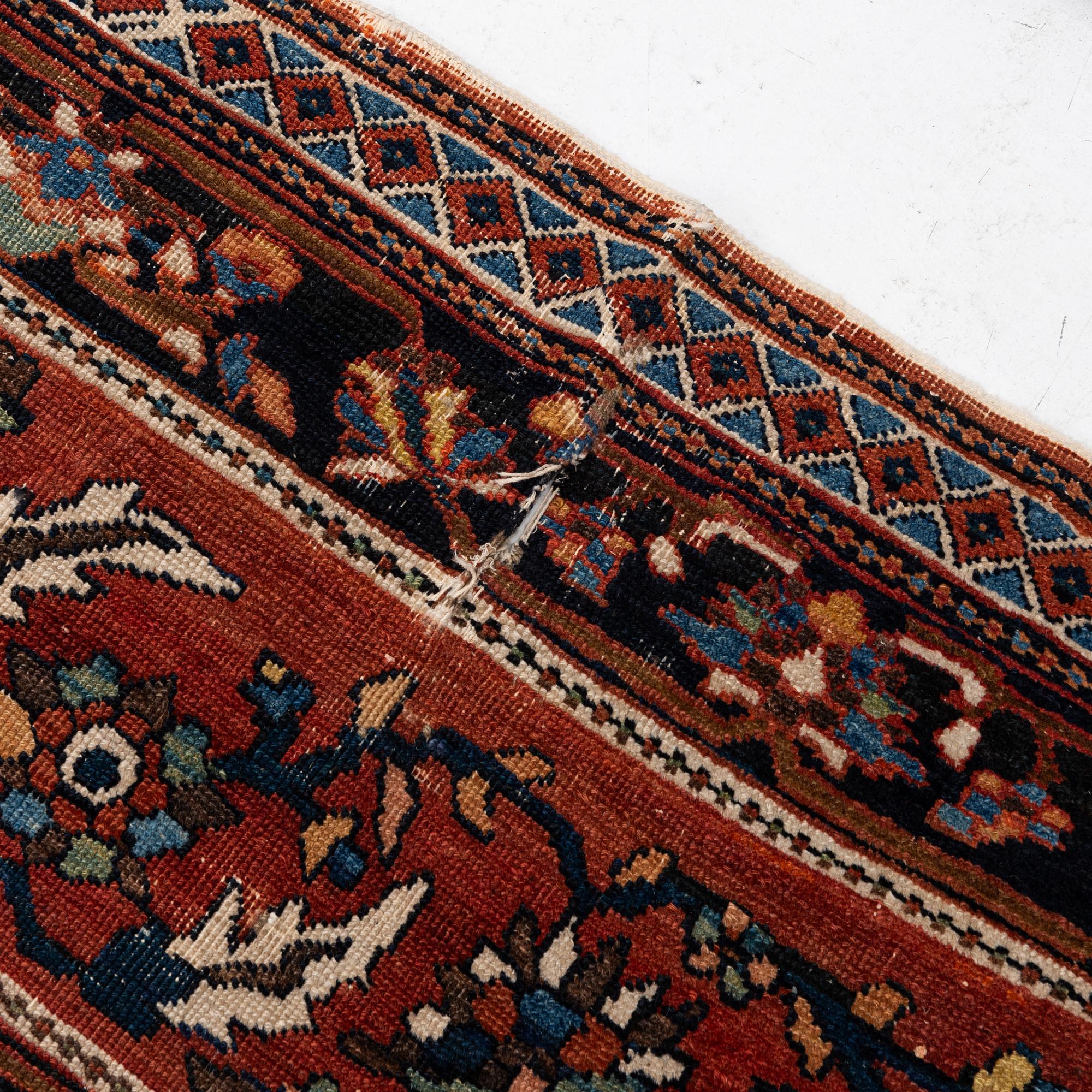 An antique 'khan carpet', Bakhtiari, western persia. c. 550 x 350 cm.