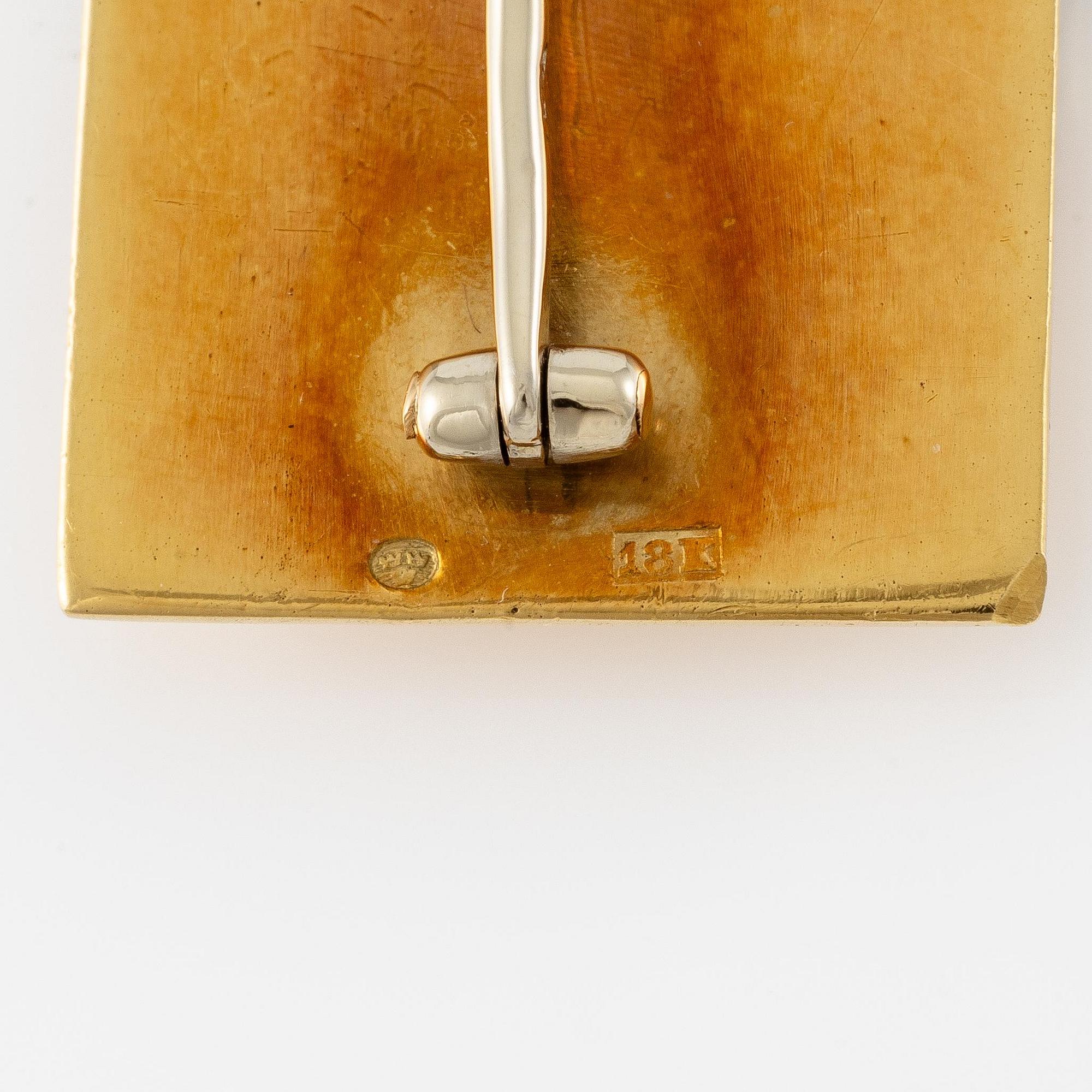 Arnaldo Pomodoro, attributed to, a brooch, 18K gold with rubies, Italy 1962.