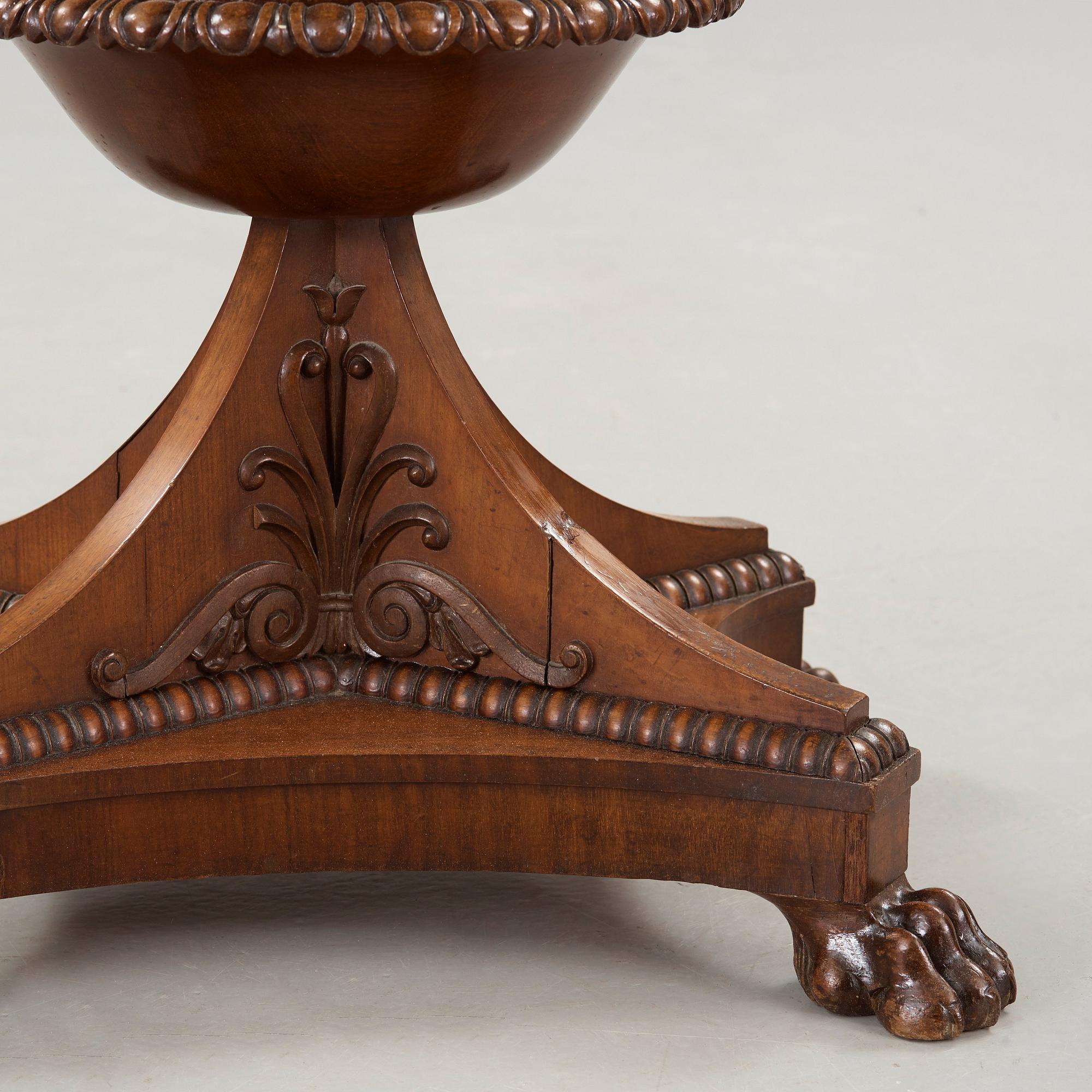 A Swedish Empire mahogny table.
