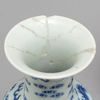 A pair of Chinese blue and white dragon vases, early 20th century, with a Qianlong mark.