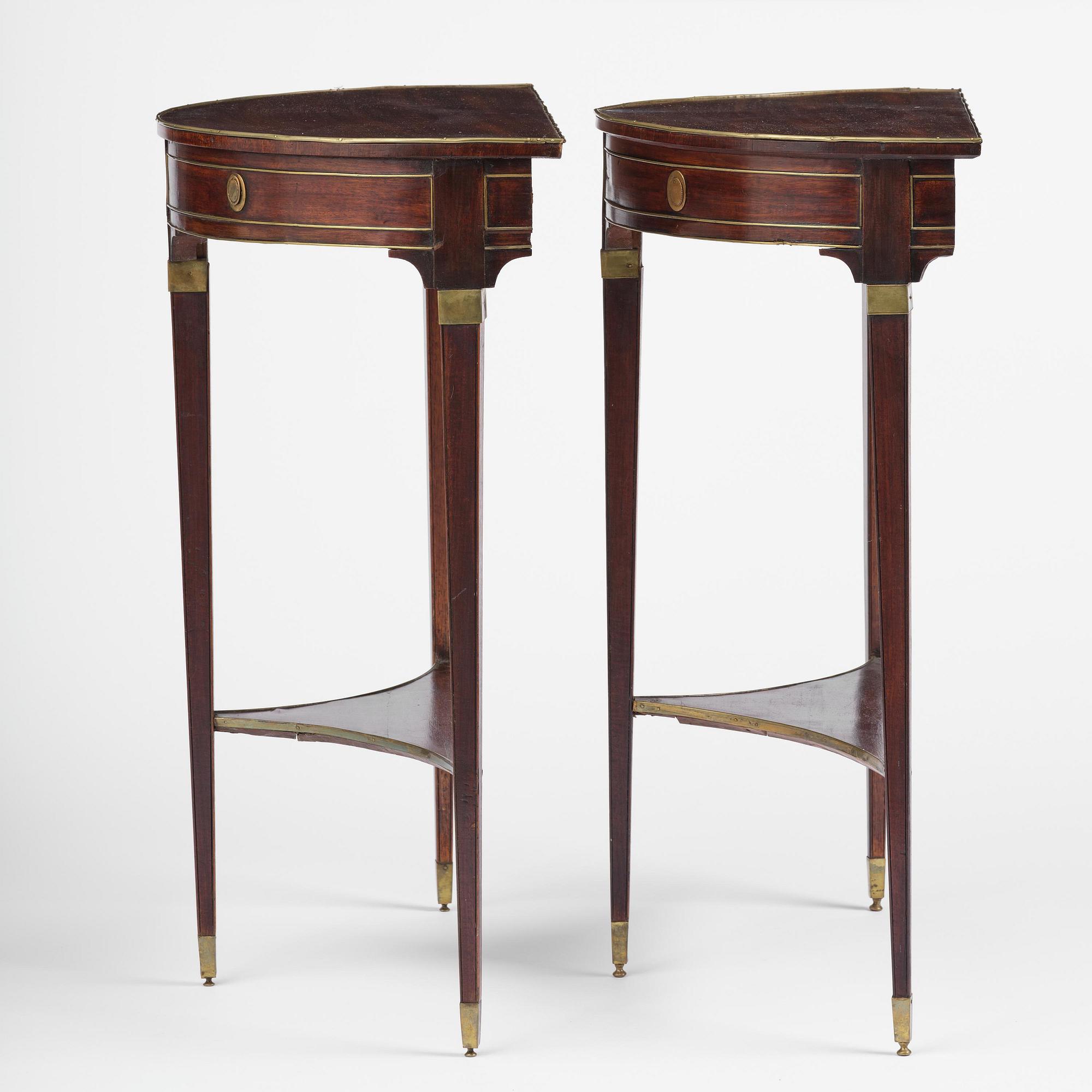A pair of late Gustavian mahogany consoles in the manner of A. Lundelius, Stochkolm, late 18th century.